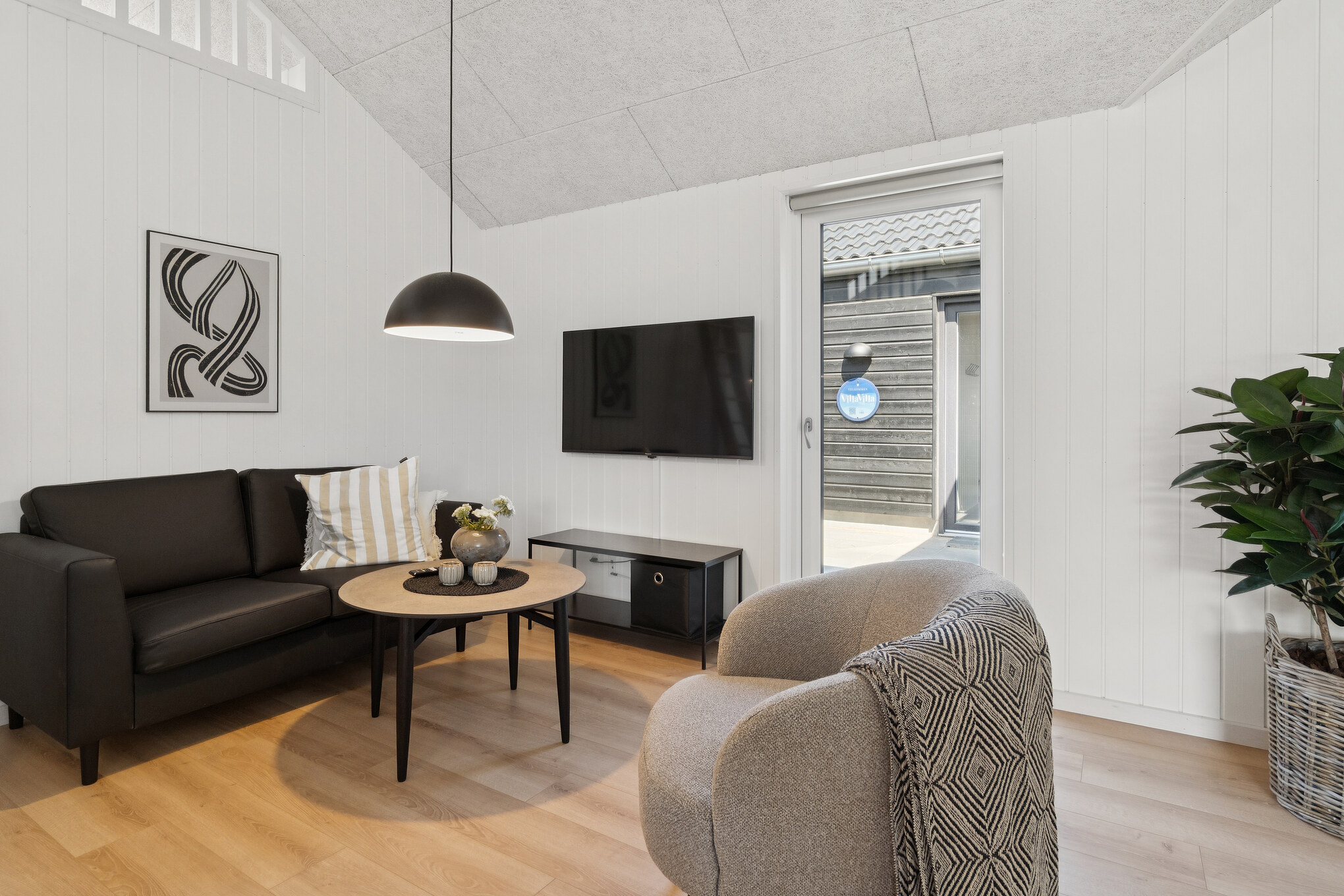 Tävla i sommarhusets aktivitetsrum när ni besöker lyxhus nr 811 i Østjylland.