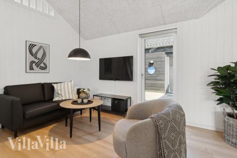 Tävla i sommarhusets aktivitetsrum när ni besöker lyxhus nr 811 i Østjylland.