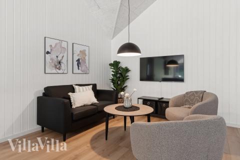 Tävla i sommarhusets aktivitetsrum när ni besöker lyxhus nr 815 i Østjylland.