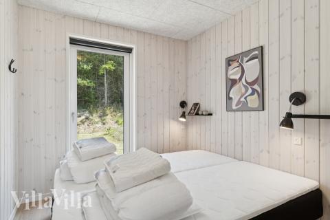 Ett av de 10 utmärkta sovrummen i lyxstuga nr 815 i Østjylland.