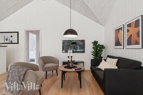 Aktivitetsrum i lyxstuga nr 817 med 9 sovrum och plats för 24 personer.