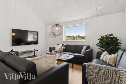 Soffhörnan i lyxstuga 817 i Østjylland.