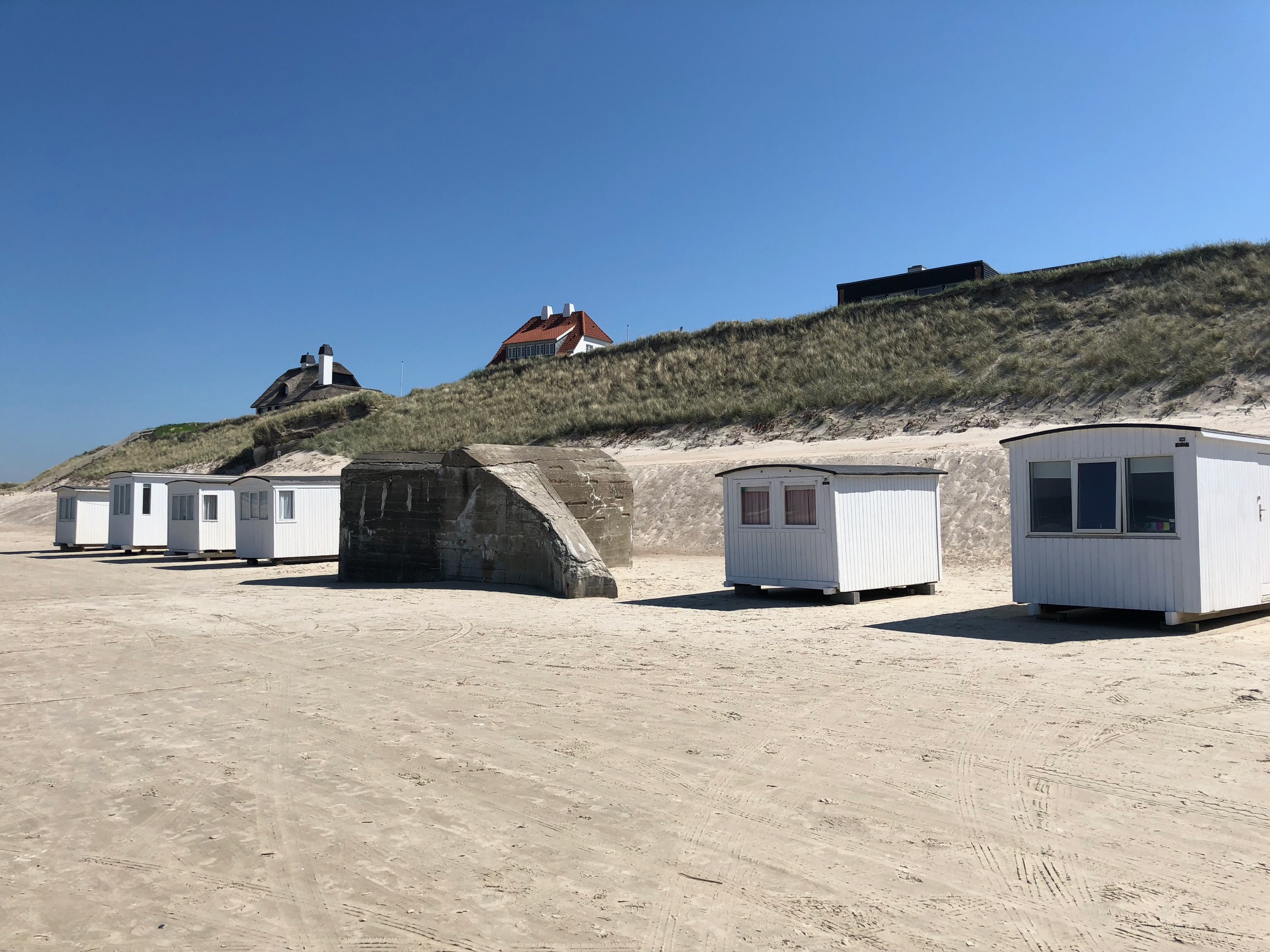 Stranden i närheten av lyxhus 902.