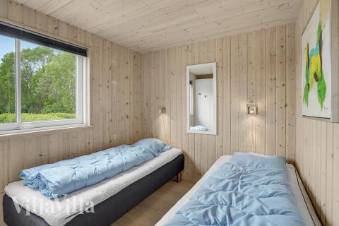 Ett av de 7 utmärkta sovrummen i lyxstuga nr 281 i Sydjylland.