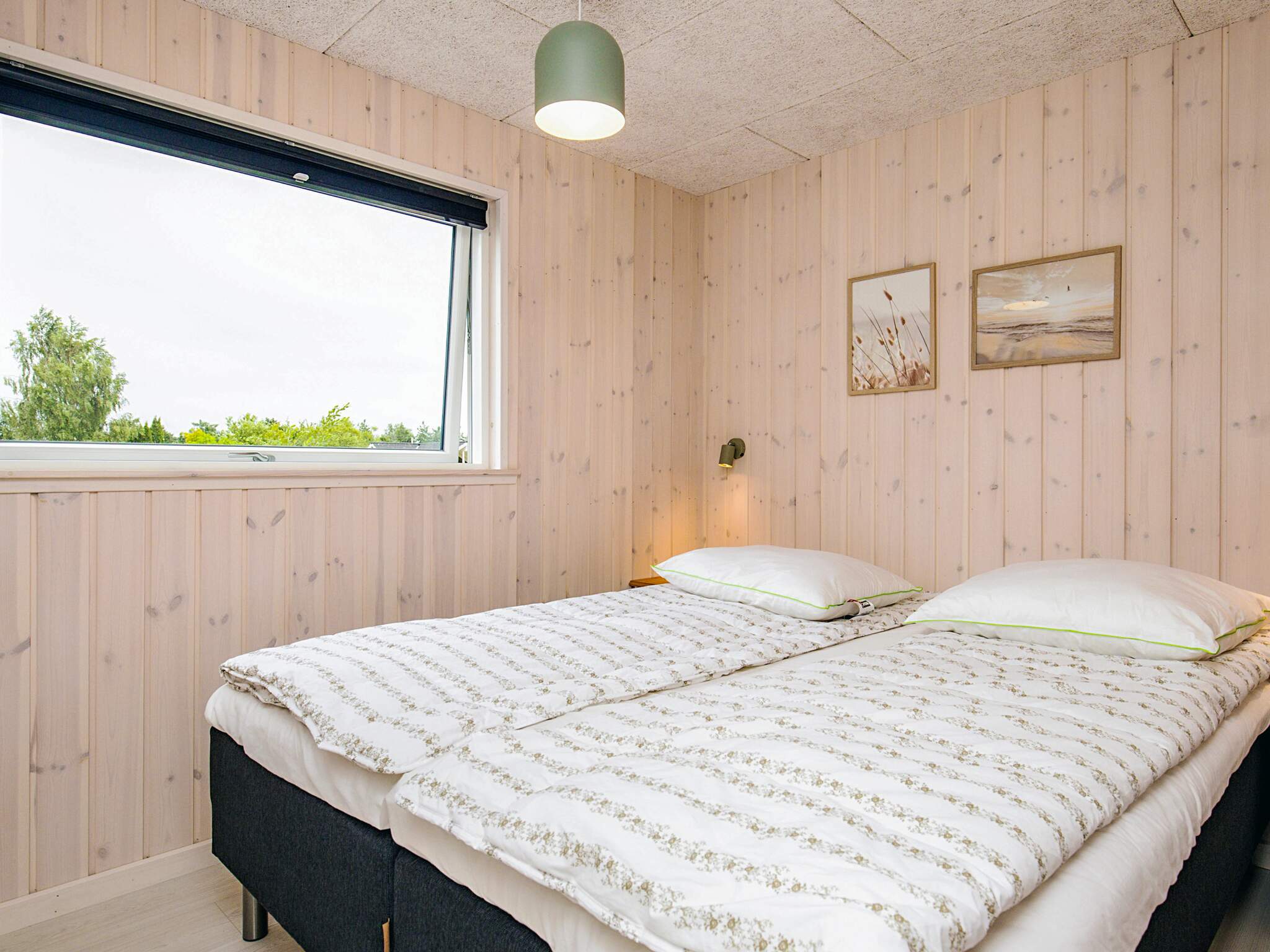 Ett av de 5 utmärkta sovrummen i lyxstuga nr 670 i Lolland/Falster/Møn.
