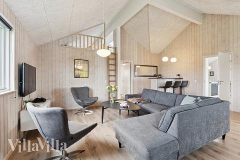 Tävla i sommarhusets aktivitetsrum när ni besöker lyxhus nr 404 i Limfjorden.