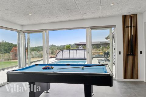 Aktivitetsrum i lyxstuga nr 686 med 10 sovrum och plats för 36 personer.