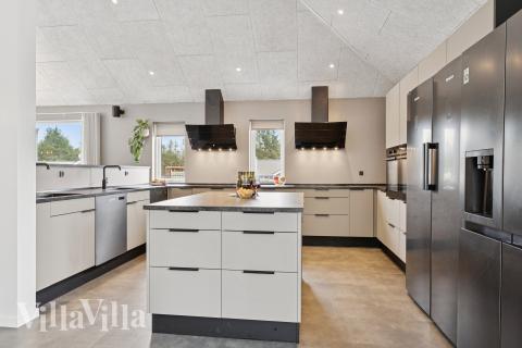 Köket i lyxstuga nr 686 är utrustat så att ni kan laga mat till 36 personer.