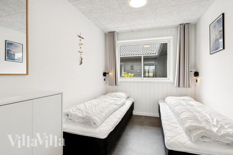 Ett av de 10 utmärkta sovrummen i lyxstuga nr 686 i Limfjorden.