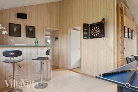 Aktivitetsrum i lyxstuga nr 292 med 7 sovrum och plats för 18 personer.