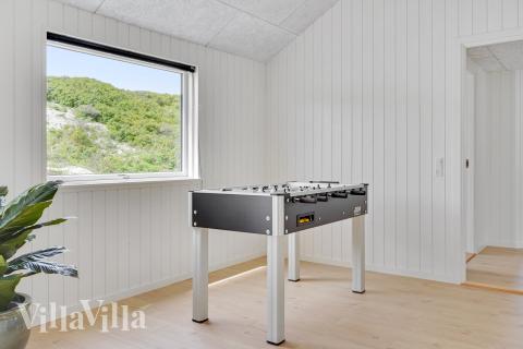 Aktivitetsrum i lyxstuga nr 900 med 7 sovrum och plats för 18 personer.