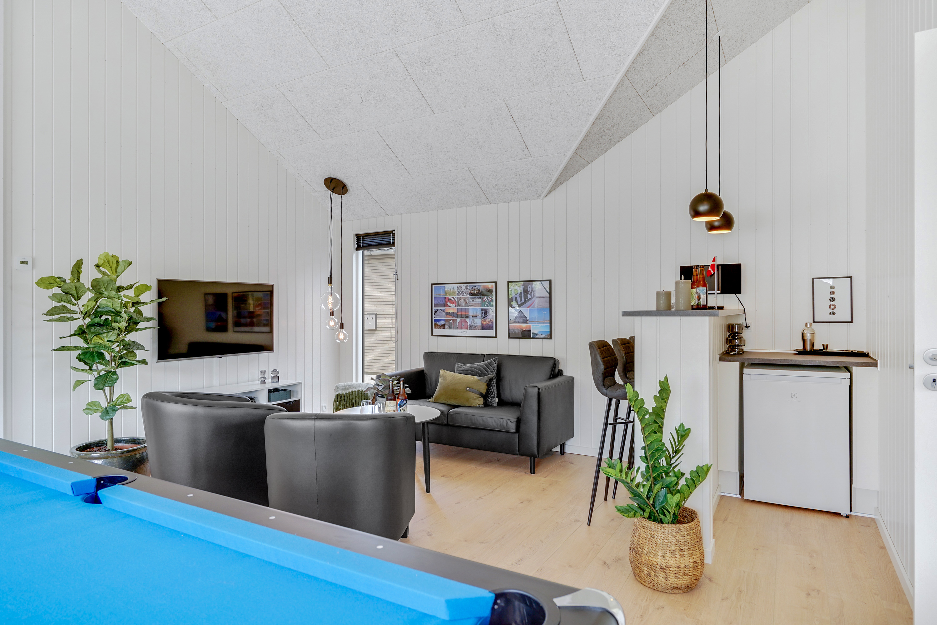 Tävla i sommarhusets aktivitetsrum när ni besöker lyxhus nr 900 i Vestjylland.