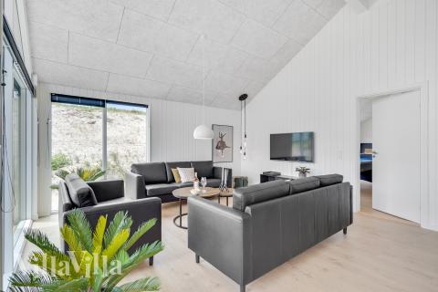 Soffhörnan i lyxstuga 900 i Vestjylland.