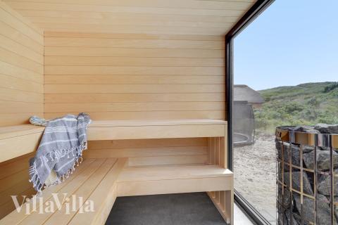 Njut av bastuvärmen i lyxstuga nr 900 för 18 personer