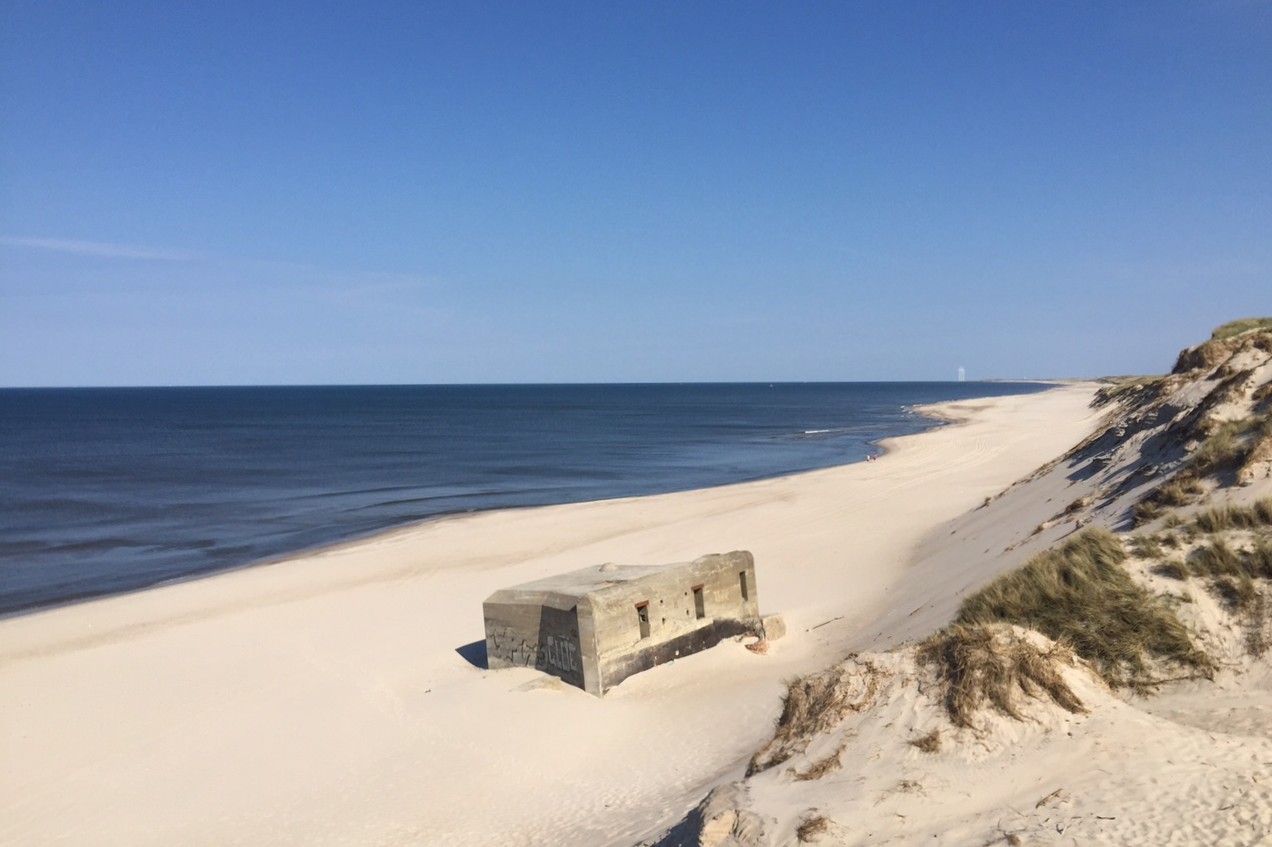 Stranden i närheten av lyxhus 900.