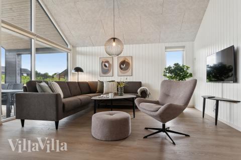 När ni besöker lyxhus nr 907 kan ni mysa tillsammans i sofforna.