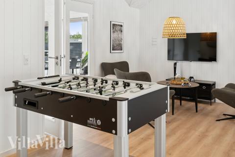 Aktivitetsrum i lyxstuga nr 697 med 8 sovrum och plats för 20 personer.