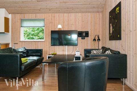 Aktivitetsrum i lyxstuga nr 223 med 7 sovrum och plats för 18 personer.