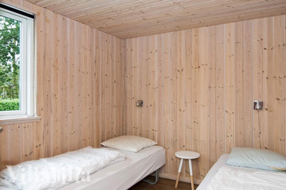 Ett av de 7 utmärkta sovrummen i lyxstuga nr 223 i Østjylland.