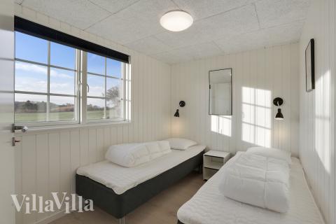 Ett av de 10 utmärkta sovrummen i lyxstuga nr 415 i Fyn och öar.