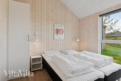 Ett av de 10 utmärkta sovrummen i lyxstuga nr 699 i Nordjylland.
