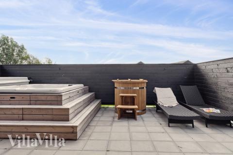 Njut av spabadets värme i lyxstuga nr 655 i Fyn och öar