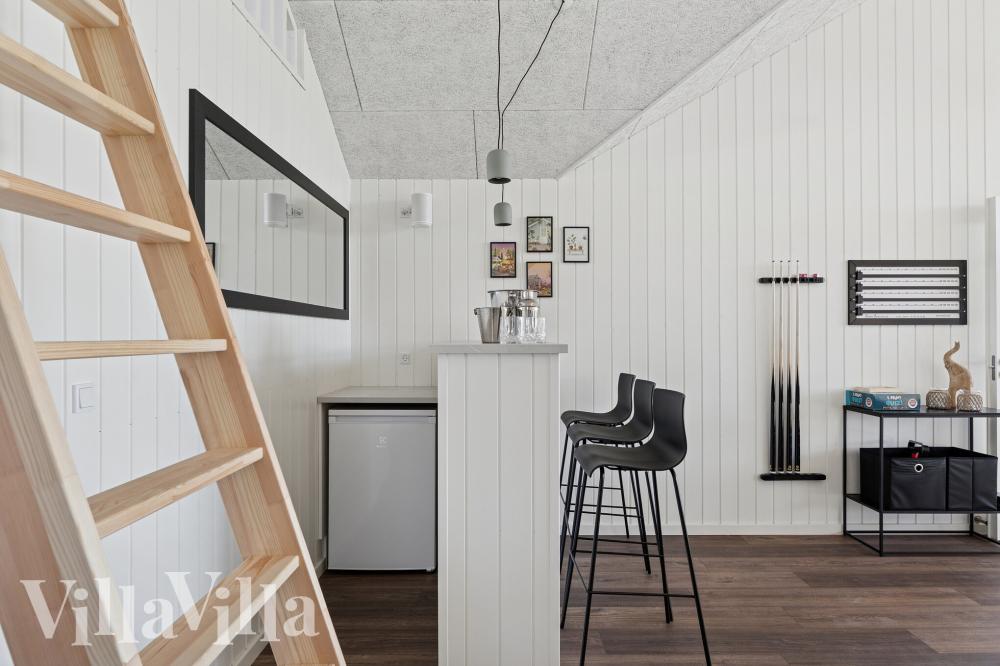 Aktivitetsrum i lyxstuga nr 673 med 8 sovrum och plats för 20 personer.