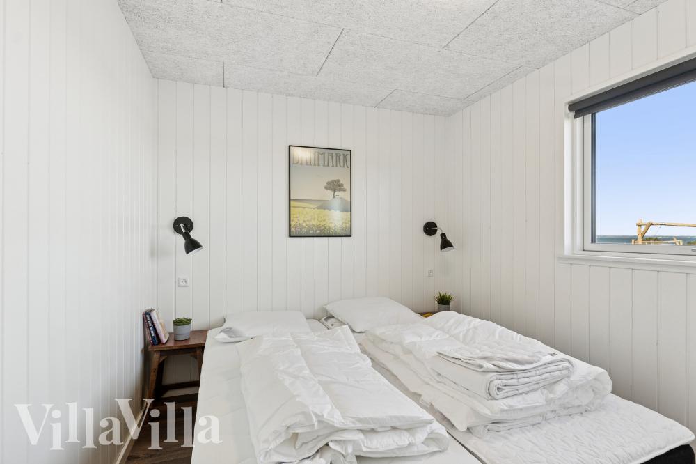 Ett av de 8 utmärkta sovrummen i lyxstuga nr 673 i Fyn och öar.