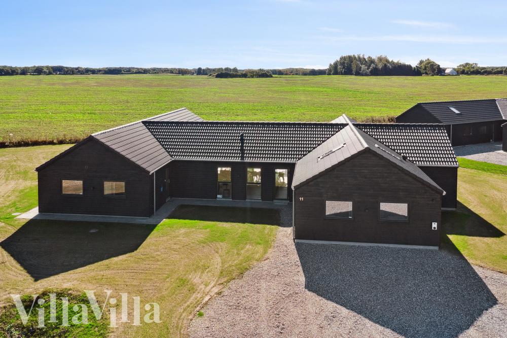 Den praktfulla poolstugan nr 673 med plats för 20 personer ligger i Fyn och öar