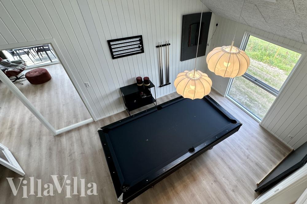 Tävla i sommarhusets aktivitetsrum när ni besöker lyxhus nr 698 i Vestjylland.