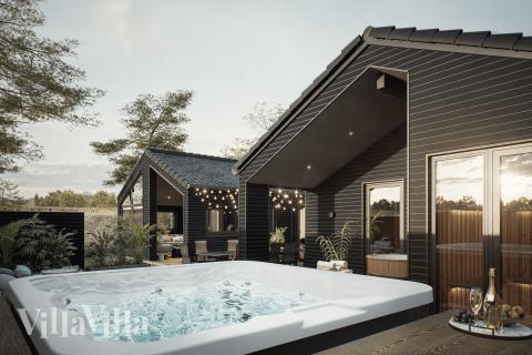 Njut av spabadets värme i lyxstuga nr 931 i Østjylland