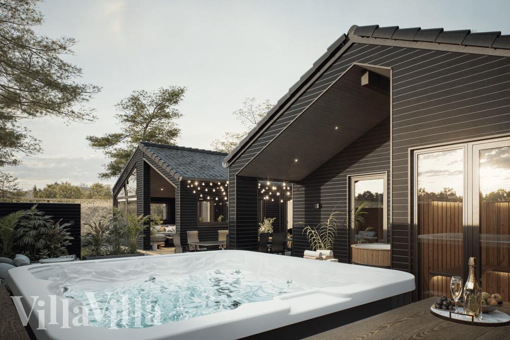 Njut av spabadets värme i lyxstuga nr 931 i Østjylland