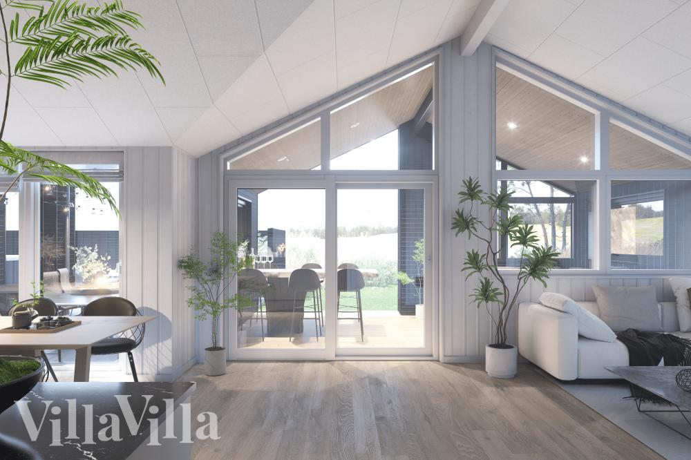 Det stora ljusa vardagsrummet i lyxstuga nr 931 för 14.