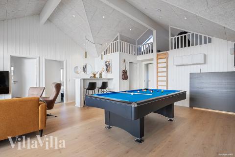 Tävla i sommarhusets aktivitetsrum när ni besöker lyxhus nr 901 i Fyn och öar.