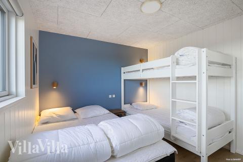 Ett av de 8 utmärkta sovrummen i lyxstuga nr 901 i Fyn och öar.