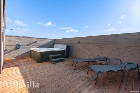 Njut av spabadets värme i lyxstuga nr 901 i Fyn och öar