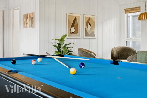 Aktivitetsrum i lyxstuga nr 912 med 7 sovrum och plats för 18 personer.