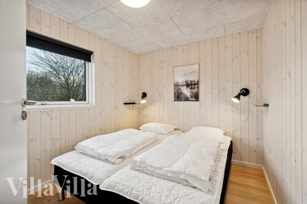 Ett av de 7 utmärkta sovrummen i lyxstuga nr 912 i Lolland/Falster/Møn.