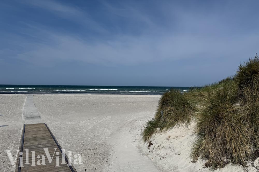 Stranden i närheten av lyxhus 912.