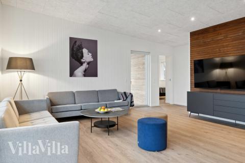 Soffhörnan i lyxstuga 936 i Limfjorden.