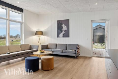 När ni besöker lyxhus nr 936 kan ni mysa tillsammans i sofforna.