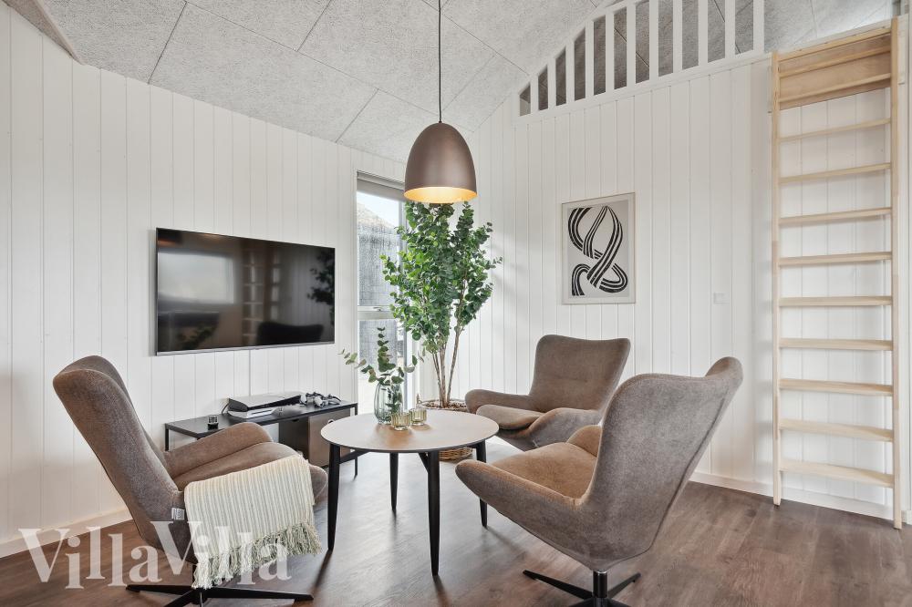 Tävla i sommarhusets aktivitetsrum när ni besöker lyxhus nr 918 i Vestjylland.