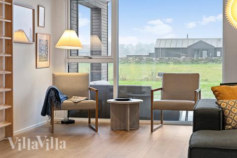 När ni besöker lyxhus nr 903 kan ni mysa tillsammans i sofforna.