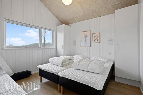 Ett av de 7 utmärkta sovrummen i lyxstuga nr 903 i Nordjylland.