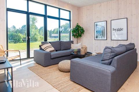 Soffhörnan i lyxstuga 938 i Østjylland.