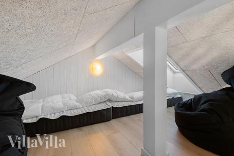 Några av de 20 sovplatserna finns på loftet i lyxstuga nr 808