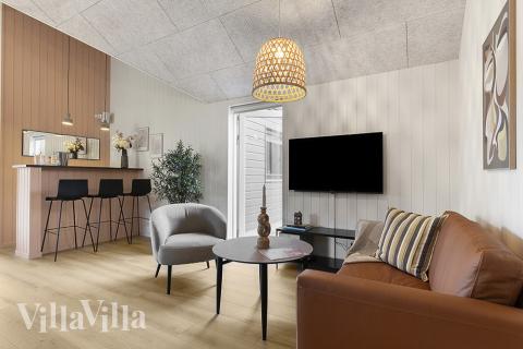 Aktivitetsrum i lyxstuga nr 802 med 6 sovrum och plats för 16 personer.