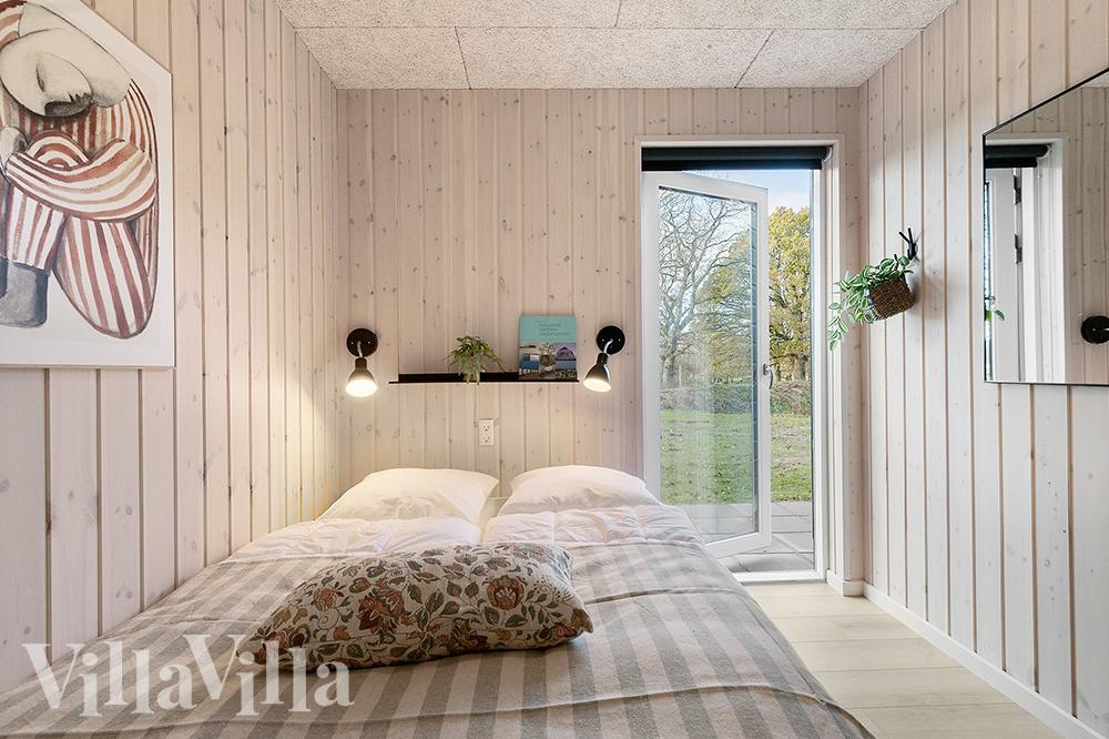 Ett av de 6 utmärkta sovrummen i lyxstuga nr 802 i Østjylland.