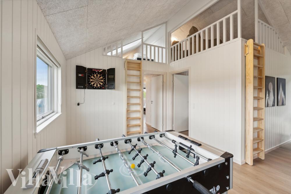 Tävla i sommarhusets aktivitetsrum när ni besöker lyxhus nr 921 i Fyn och öar.