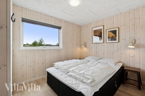 Ett av de 5 utmärkta sovrummen i lyxstuga nr 922 i Fyn och öar.